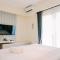Homey and Simply Look 1BR Bintaro Embarcadero Apartment By Travelio - 当格浪