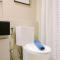 Homey and Simply Look 1BR Bintaro Embarcadero Apartment By Travelio - 当格浪