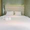 Spacious and Homey 2BR at Tree Park City Cikokol Apartment By Travelio - 当格浪
