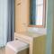 Spacious and Homey 2BR at Tree Park City Cikokol Apartment By Travelio - 当格浪