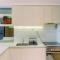 Spacious and Homey 2BR at Tree Park City Cikokol Apartment By Travelio - 当格浪