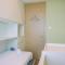 Spacious and Homey 2BR at Tree Park City Cikokol Apartment By Travelio - 当格浪
