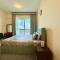 Homes 2 Retreat - Chic 1BR with Balcony & Lake Views in JLT - Dubaj