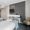 Modern Nomads Metro Urban Studio with City View and Indoor Pool