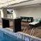 1BHK Zameen Opal,Pool Gym Cinema &Rooftop Access - لاهور