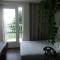 Charmant logement Guidel Plage, vue mer, piscine chauffée, avec une chambre