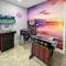 Vacay Spot Gables 4 to 23 Guest GameRoom 2 Kitchens 2 BBQ, 2 BAR, Backyard, Patio, Prime LOC! 6 blocks away from Bars, Nite Clubs, Res, Shops