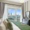 Stylish 1BR Apartment in JVC near Circle Mall - Dubaj