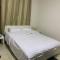 Comfort Suite Near Triumph Luxury Hotel