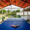 StayVistas Lumos Paradise - Villa with Infinity Pool, Terrace, Expansive Lawn & Gazebo