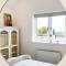 Spinneys Boathouse by The Suffolk Cottage Collection