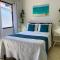 Suites Casa Azul-Vila do Abraão- conforto, limpeza, ótima localização - 阿布拉奥