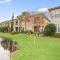 4 Bedroom house on the golf course with 2 golf carts!