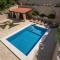 Six-Bedroom Holiday Home In Klek