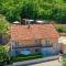 Four-Bedroom Holiday Home In Grubine