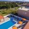 Four-Bedroom Holiday Home In Brodarica