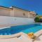Two-Bedroom Holiday Home Jezera With A Fireplace 05