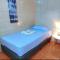 Hostel del Pacífico Habitación con baño privado y aire acondicionado