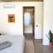 Casa Remy - Walk to the Beach and stay in a private compound! Pool, Kitchen, AC, Wi-Fi