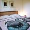 Casa Remy - Walk to the Beach and stay in a private compound! Pool, Kitchen, AC, Wi-Fi