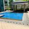 Two Palm Tree Villas Condominium - Studio 1O with Balcony - Across Terminal 3 Airport - مانيلا