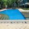 Two Palm Tree Villas Condominium - Studio 1O with Balcony - Across Terminal 3 Airport - مانيلا
