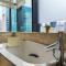 Apt Sudirman Suite 3BR With Infinity Pool & Netflix - Dżakarta