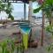 Camacho Beachfront House - A Tranquil Secluded Beach - 巴旺