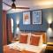 Gillis Eight Guest Rooms by Romy&Travis