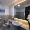 Comfy and Modernly Decorated 2 Bedroom Unit with free Parking - Багио