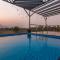 StayVistas One Villa - Pet-friendly charm with Farm views, Modern decor & A refreshing plunge pool