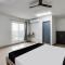 Super Hotel O ECR Stays Near Nemmeli Beach Formerly GVS Homes