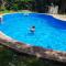 Casa quinta con gran parque, pileta y parrilla a 15 min del aeropuerto