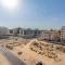 1BR APT with Gym Access and Rooftop Pool - Dubaj