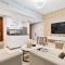 1BR APT with Gym Access and Rooftop Pool - Dubaj