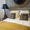 Cosy Loft tarif avec 1 ou 2 chambres 2 ou 4 personnes, vue parc et piscine