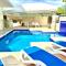 Luxury House on Clifton Beach with Heated Saltwater Swimming Pool