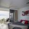 Frangipani 206 beachfront apartment