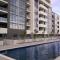 Modern 1 Bedroom apartment with Pool, Gym & Water Views