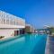 Tumbi West Palm Beach Hotel Dubai,Tapestry Collection Hilton