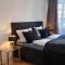 Große Ferienwohnung Nähe Stadtpark, 4 Schlafzimmer, gemütliches Wohnzimmer, Terrasse, Parkplatz