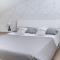 Otium Rooms / Camere e Appartamenti