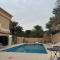 Al Ain Hotel Apartment Family Stay with Balcony and Pool Access