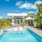 White Villas - Romantic Getaway - Oceanside Large Modern Studio with Pool, 500ft from Long Bay Beach