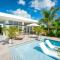 White Villas - Romantic Getaway - Oceanside Large Modern Studio with Pool, 500ft from Long Bay Beach