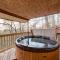 Cozy Deer Glen Cabin with Private Hot Tub and Porch!