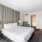 Modern Nomads Beautiful King Studio with Indoor Pool & Balcony