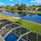 Brand new 4-bedroom electric-heated pool home on canal - Villa Cape Vida - كيب كورال