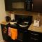 Foto: Elite Suites - Executive Furnished Suites 12/60