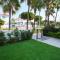 WealthyStays 2BR Retreat , 5Min Walk to Beach